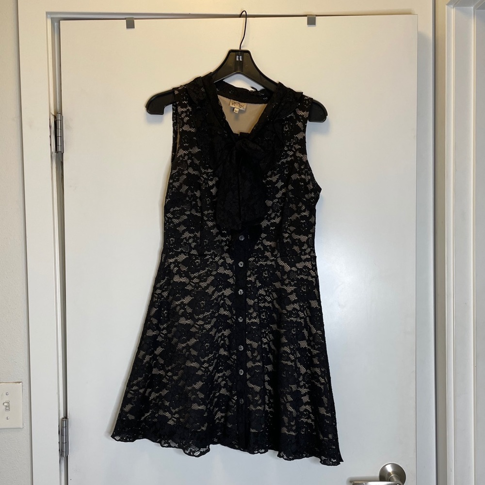 Lace button up dress with pussy bow.